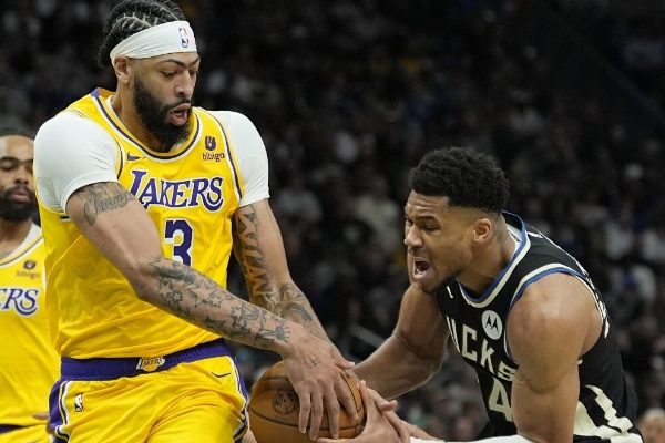 湖人双加时险胜雄鹿罚球命中率创新高