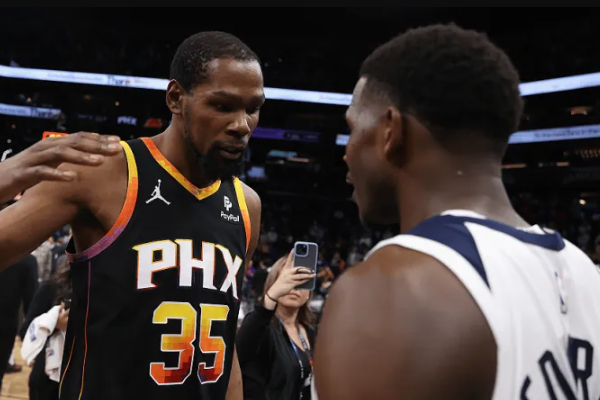 爱德华兹与杜兰特绽放光芒助森林狼122-116击败太阳